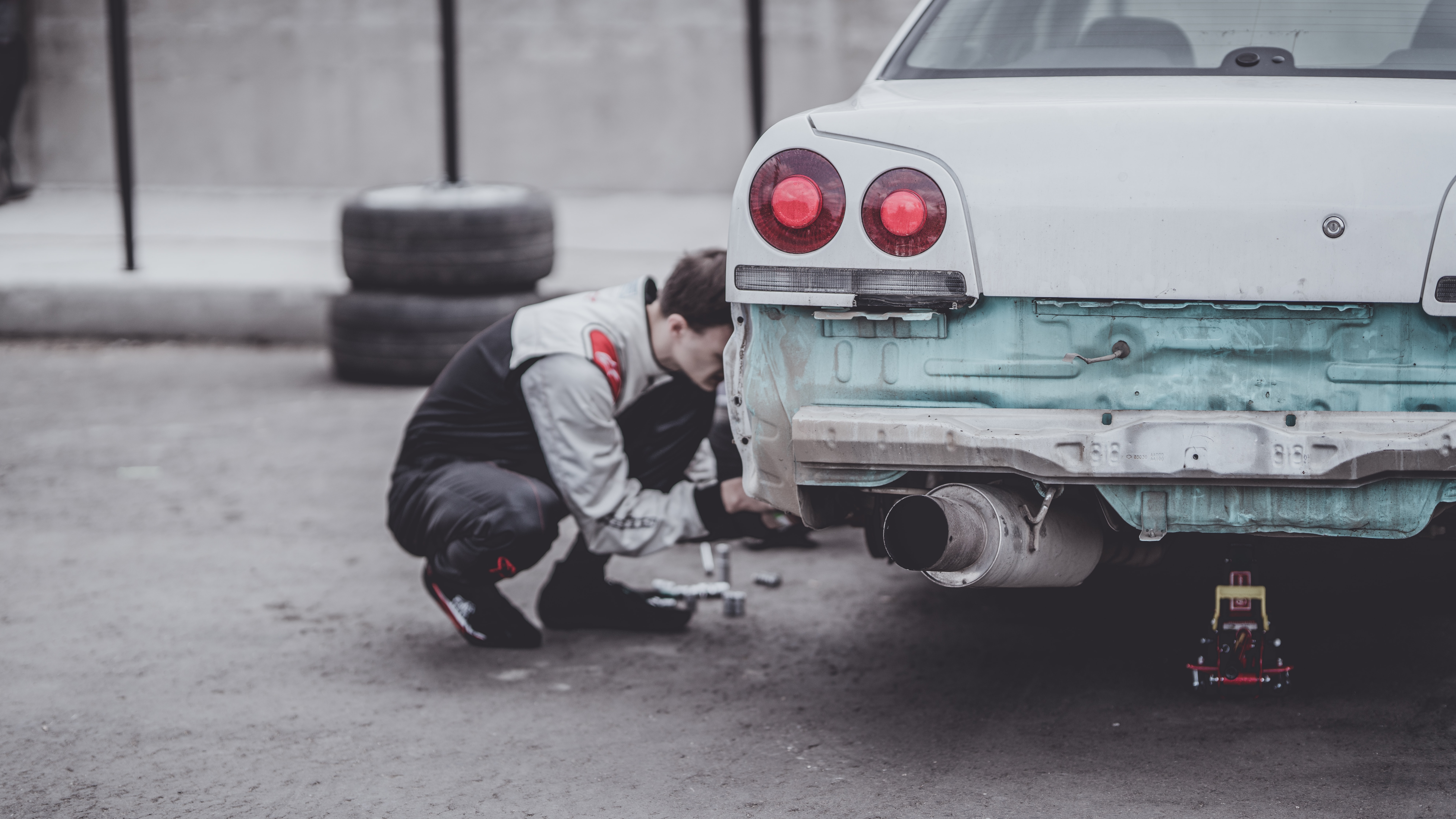 Man repairing car