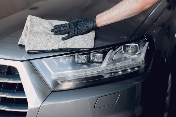 Car Hood Being Waxed